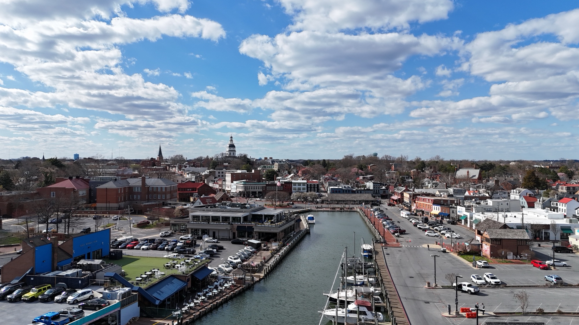 Downtown Annapolis with the Maryland State House dome above the City Dock harbor