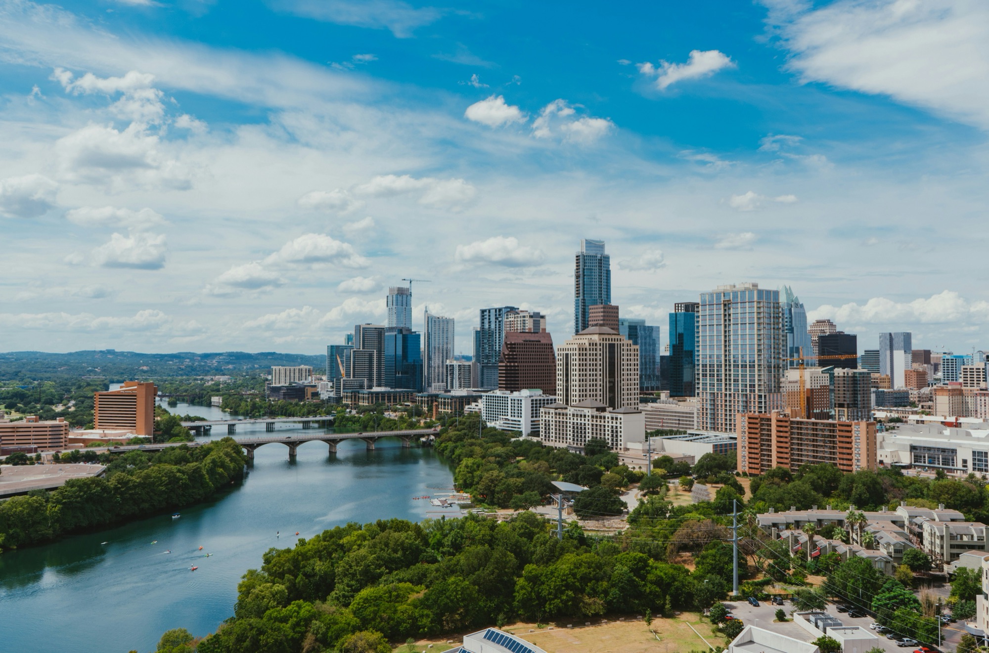 The Austin skyline above Lady Bird Lake on a bright day